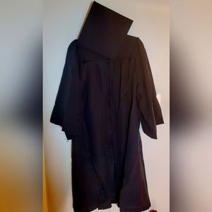 Black graduation gown and cap